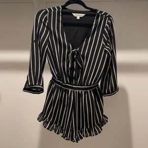 Pink lily black and white striped romper